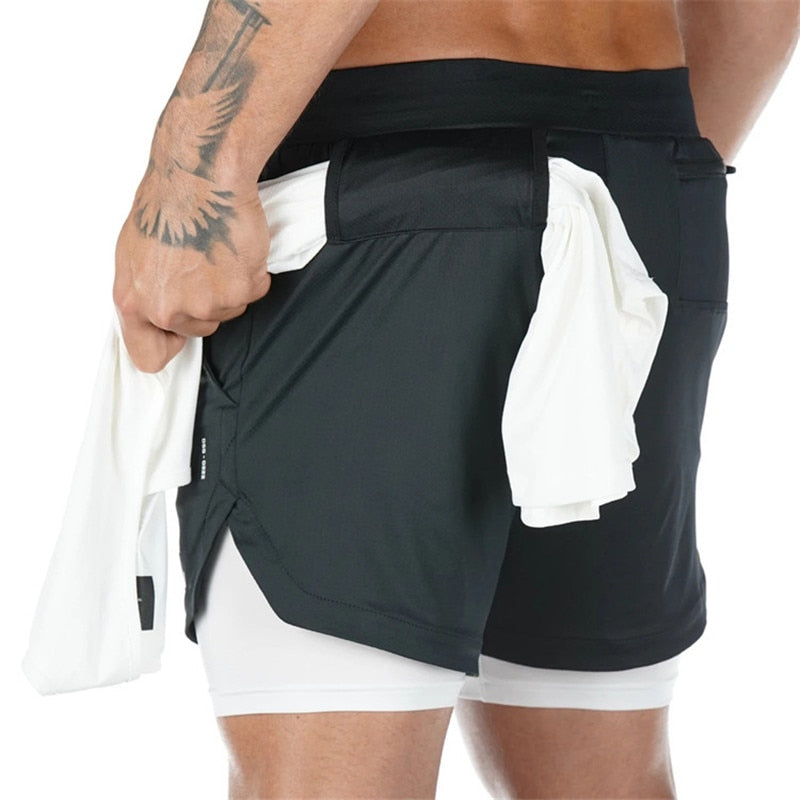 https://cdn.shopify.com/s/files/1/0575/0731/5784/files/m-nds-2-i-1-tr-ningsshorts-med-mobillomme-ideelle--8.jpg?v=1778637531