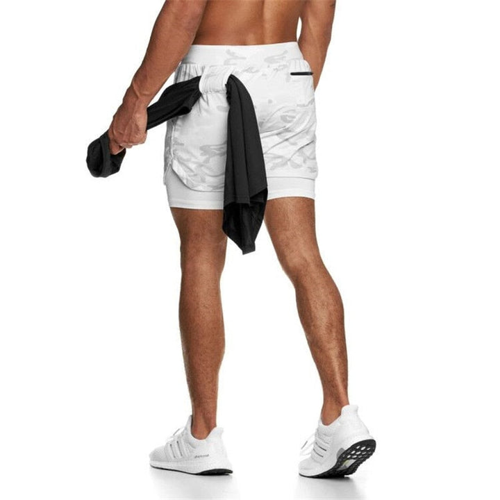 https://cdn.shopify.com/s/files/1/0575/0731/5784/files/m-nds-2-i-1-tr-ningsshorts-med-mobillomme-ideelle--9.jpg?v=1778637534