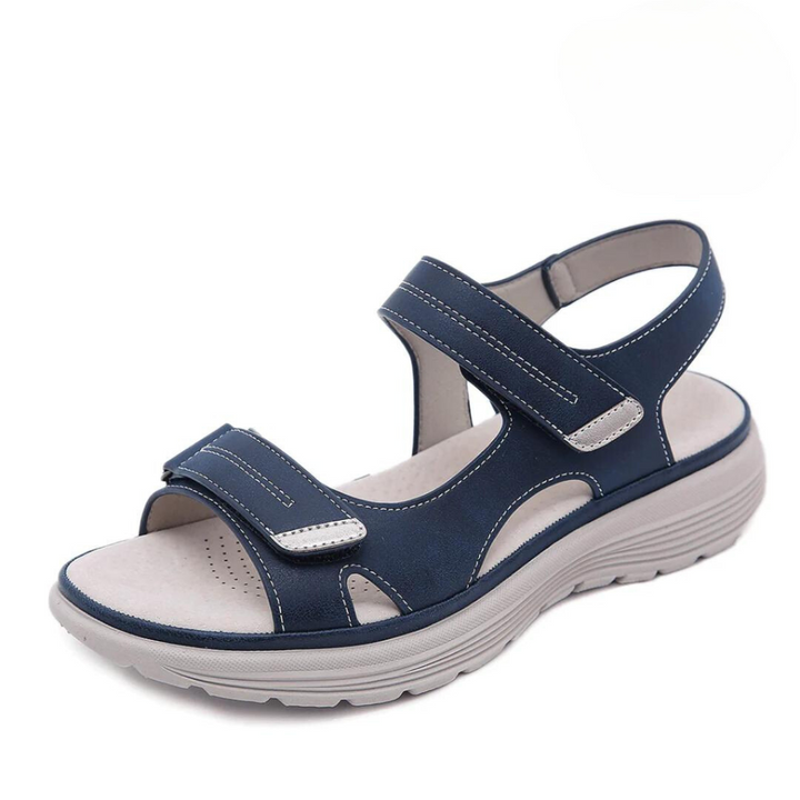 https://cdn.shopify.com/s/files/1/0575/0731/5784/files/ortopaediske-sandaler-med-ergonomisk-design-bred-taboks-og-svangstotte-perfektioneret-for-maksimal-ko-4.png?v=1748698293