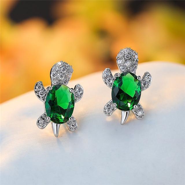 Elegante sølvøreringe med zirkonia og tangdesign