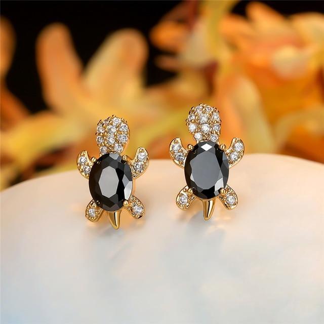 Elegante sølvøreringe med zirkonia og tangdesign