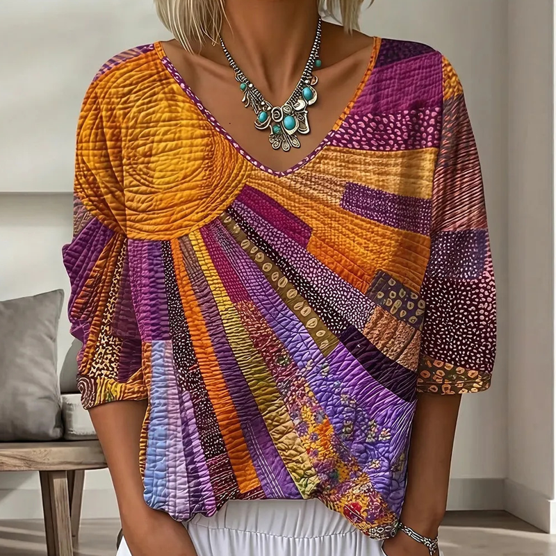 Dame-retrobluse med patchwork og V-hals