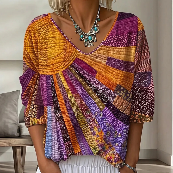 Dame-retrobluse med patchwork og V-hals