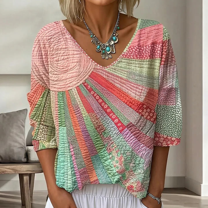 Dame-retrobluse med patchwork og V-hals