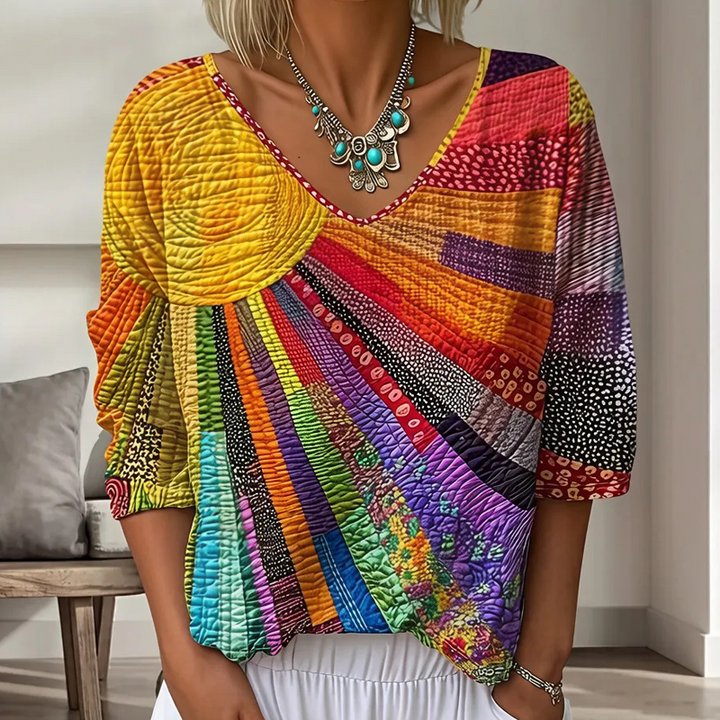 Dame-retrobluse med patchwork og V-hals
