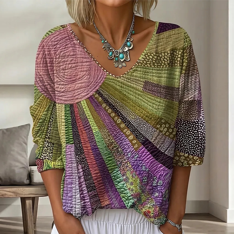 Dame-retrobluse med patchwork og V-hals