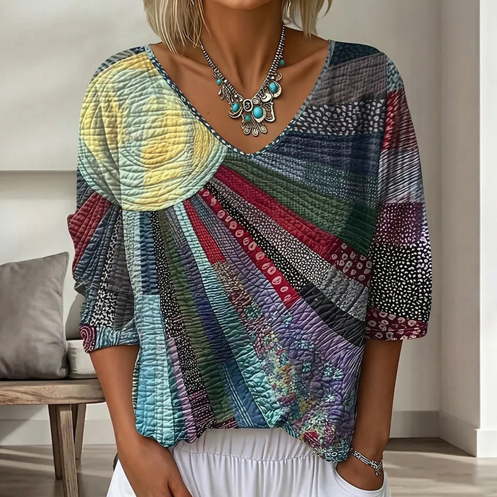 Dame-retrobluse med patchwork og V-hals