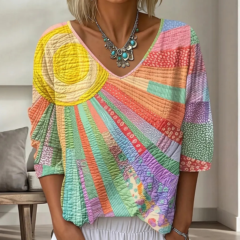 Dame-retrobluse med patchwork og V-hals