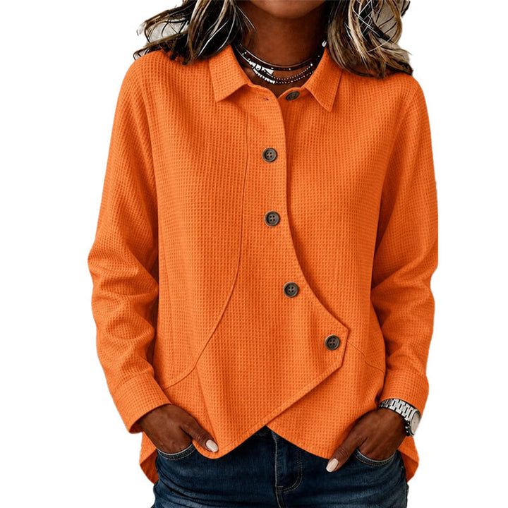 Dame-sweater med knaplukning og asymmetrisk kant forneden