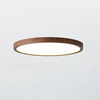 Ultratynd rund loftlampe i valnøddetræ til elegante, moderne rum