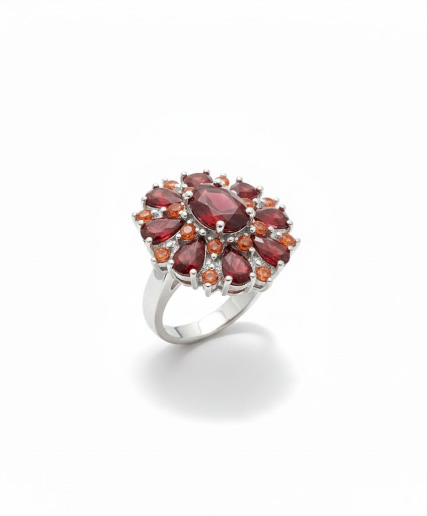 Elegant guldring med skarlagenrøde kronblade