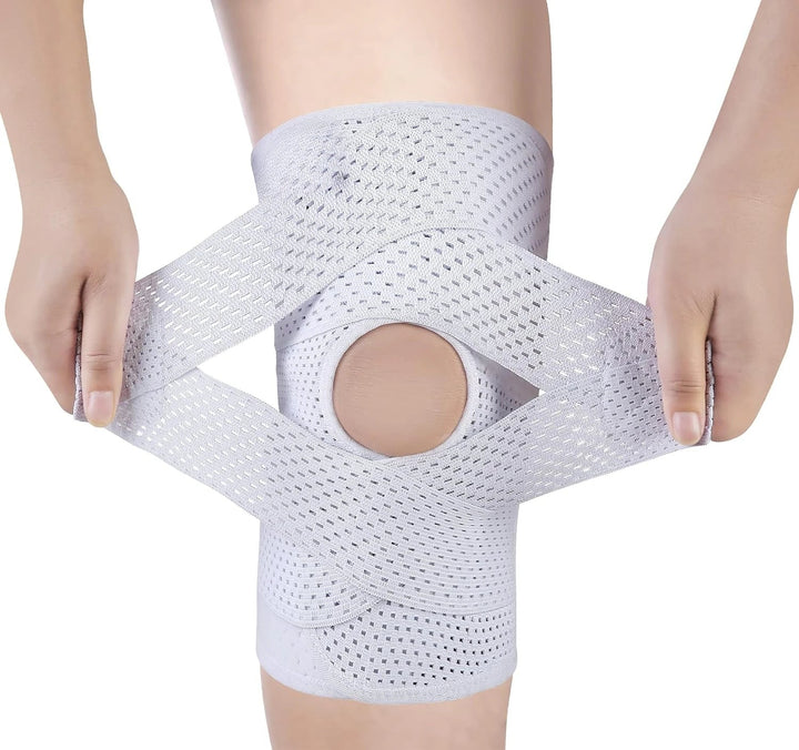 Knæbandage med justerbart kompressionssystem